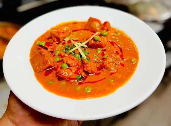 Best butter chicken at Indian Accent Kitchen and Bar Calgary